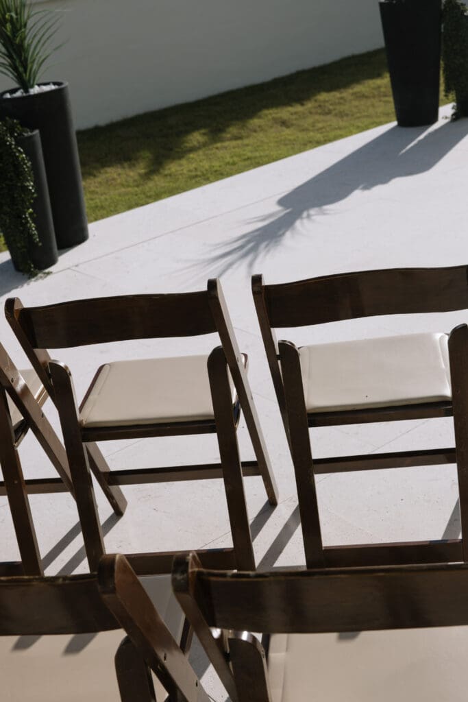 Backyard beach wedding ceremony in Rosemary Beach, Florida with ocean views and intimate guest seating