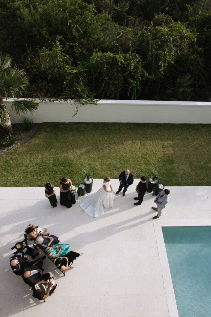 Backyard beach wedding ceremony in Rosemary Beach, Florida with ocean views and intimate guest seating