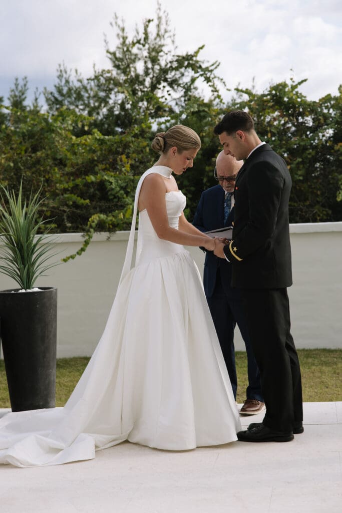 Backyard beach wedding ceremony in Rosemary Beach, Florida with ocean views and intimate guest seating