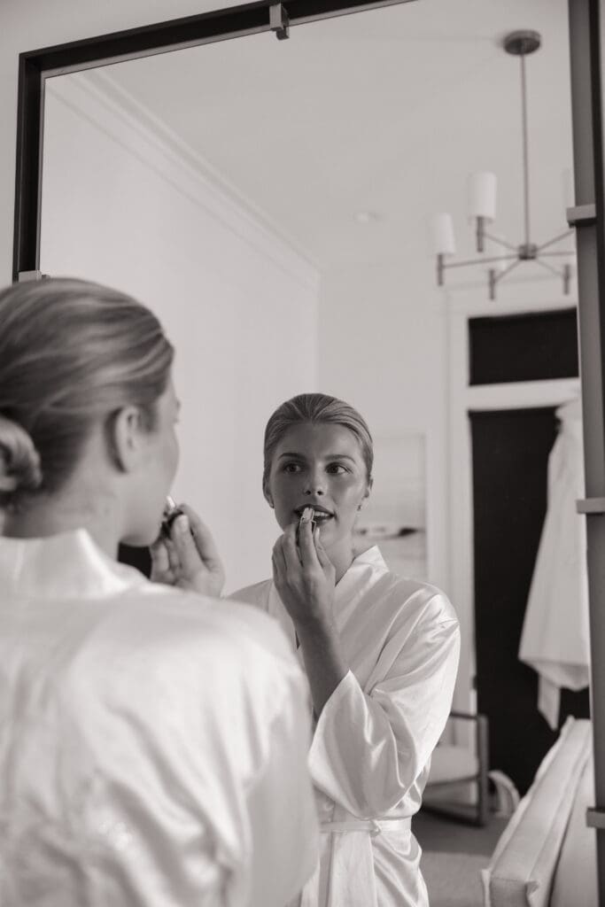 Bride getting ready at a backyard beach wedding in Rosemary Beach, Florida